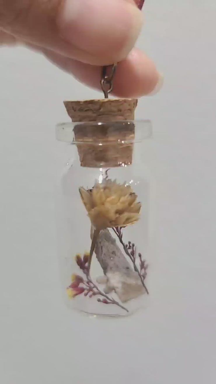 Dried Flowers and Topaz Crystal